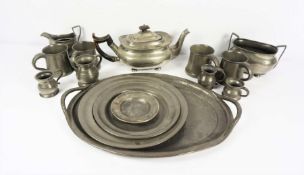 A collection of assorted pewter, including four small measures, four tankards, an oval tray, three