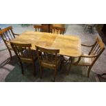 A Regency style twin pillar extending dining table, including one additional leaf, 72cm high,