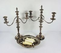 A large and good pair of George III style silver plated three light candleabra, with gadrooned