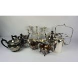 A box of assorted silver plate, including a three piece teaset, candelabrum and related (a lot)