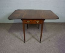 A George IV mahogany Pembroke table, circa 1825, with a drop leaf rectangular top, two end drawers
