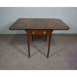 A George IV mahogany Pembroke table, circa 1825, with a drop leaf rectangular top, two end drawers