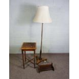A mahogany standard lamp with tri-form base, together with a small carved table and a book rack (3)