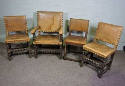 A large 17th century style oak framed armchair, with two matching chairs and an associated chair,