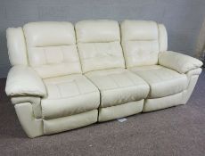 A modern white ‘leather’ settee, in three seat sections (set together or apart), 231cm long