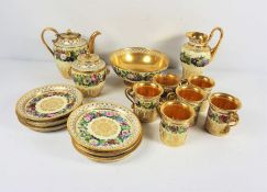 A Dresden, possibly Sèvres, porcelain six place coffee service, circa 1900, finely painted with