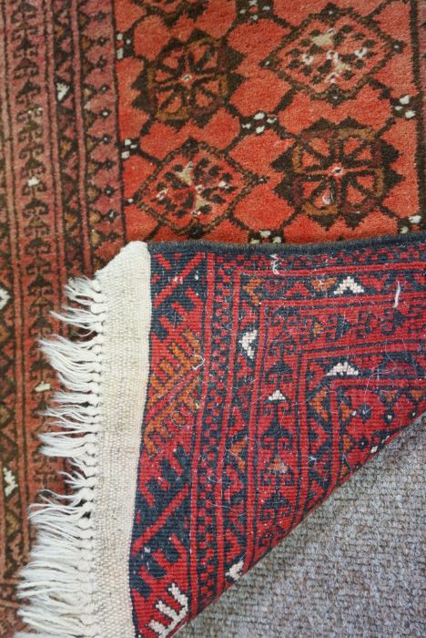 Three assorted rugs, 20th century, one with four medallions on a red ground (3) - Image 3 of 8