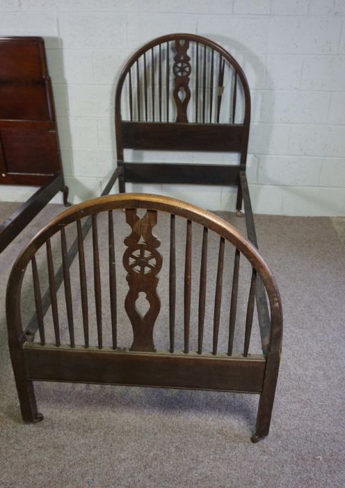 Two single bedsteads,one panelled mahogany, the other bentwood framed with wheel and fret cut - Image 2 of 4