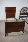 Two single bedsteads,one panelled mahogany, the other bentwood framed with wheel and fret cut