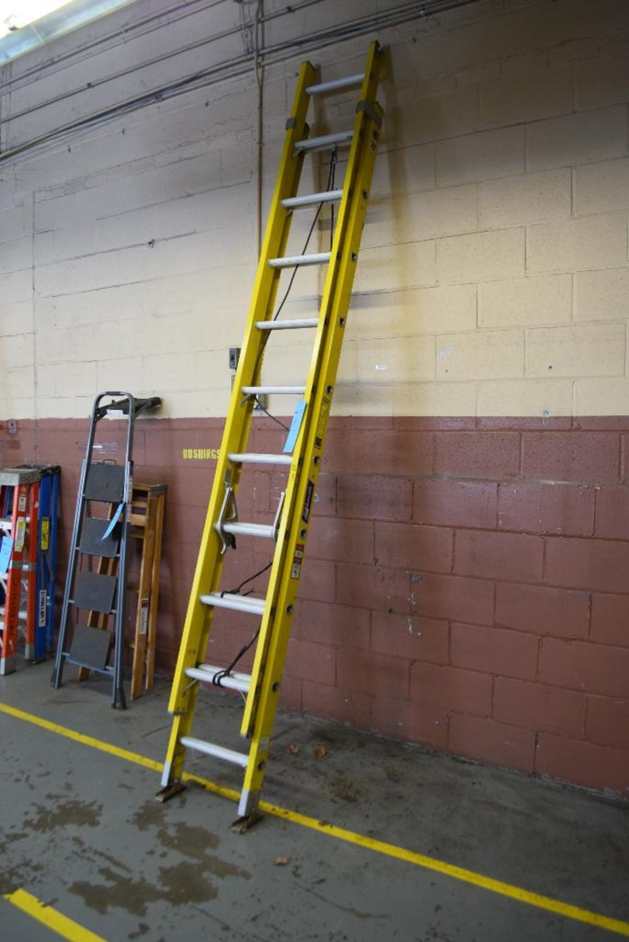 (1) Louisville approximate 20' tall fiberglass extension ladder.