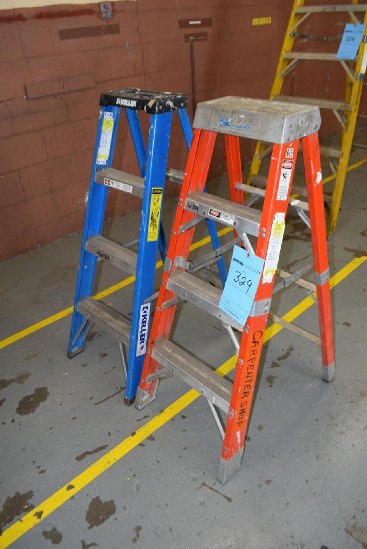 Lot of (2) approximate 4' tall fiberglass ladders.