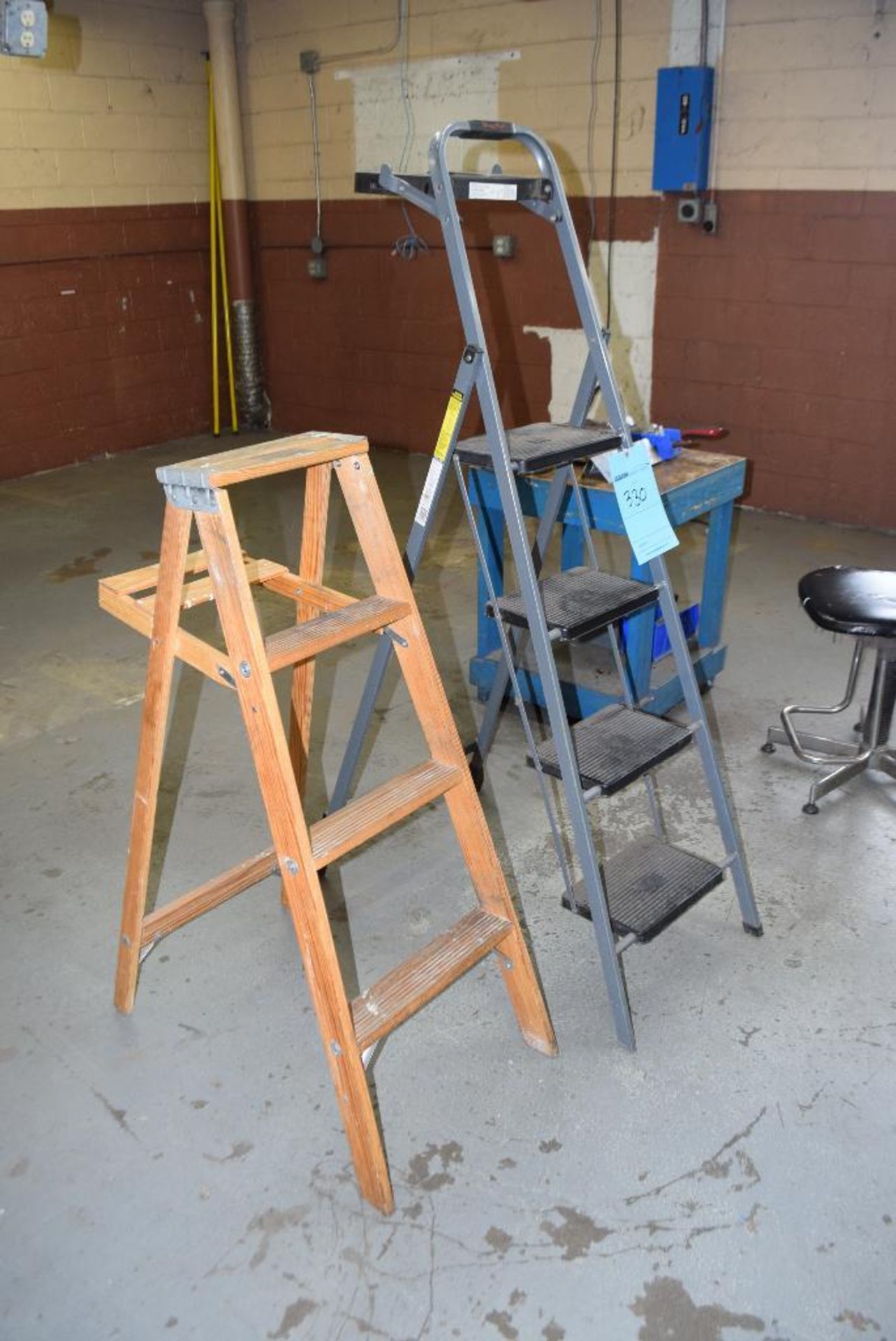 Lot of (2) ladders. (1) wood approximate 4' tall, (1) metal step ladder. - Image 2 of 3