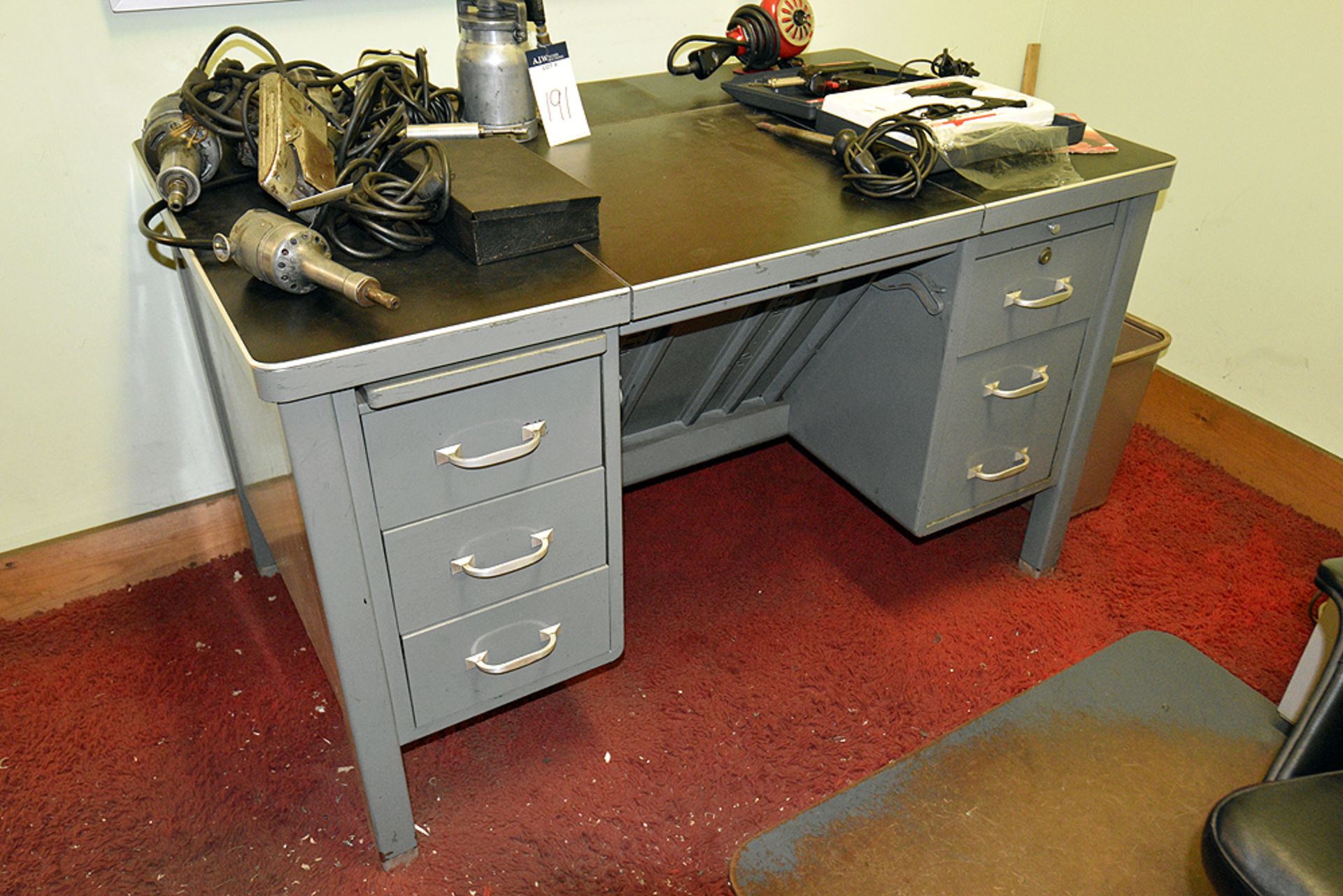 Furniture Throughout Room: (2) Desks, (3) File Cabinets, (2) Chairs & Cork Board