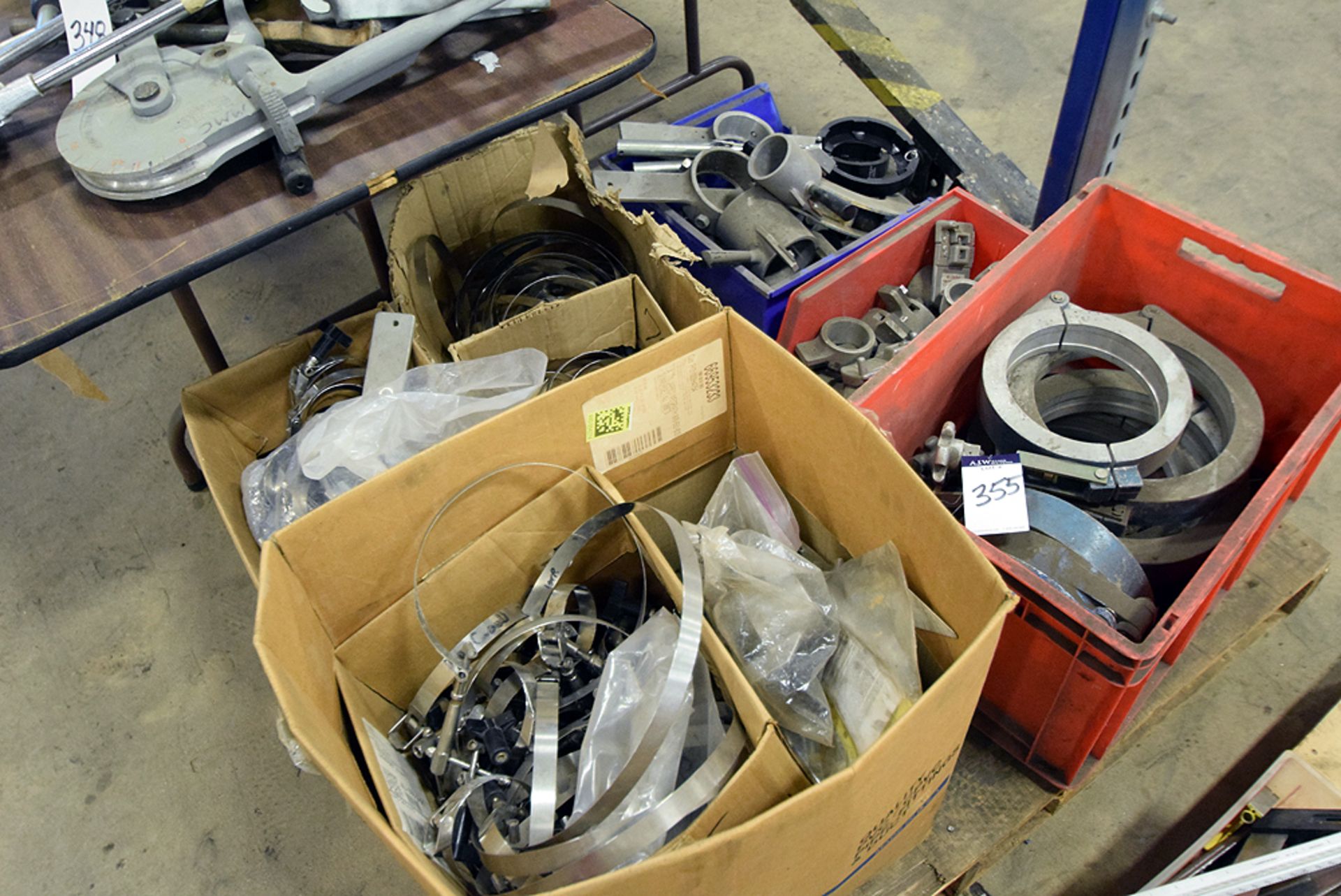 A Large Assortment of Pipe Clamps and Braces