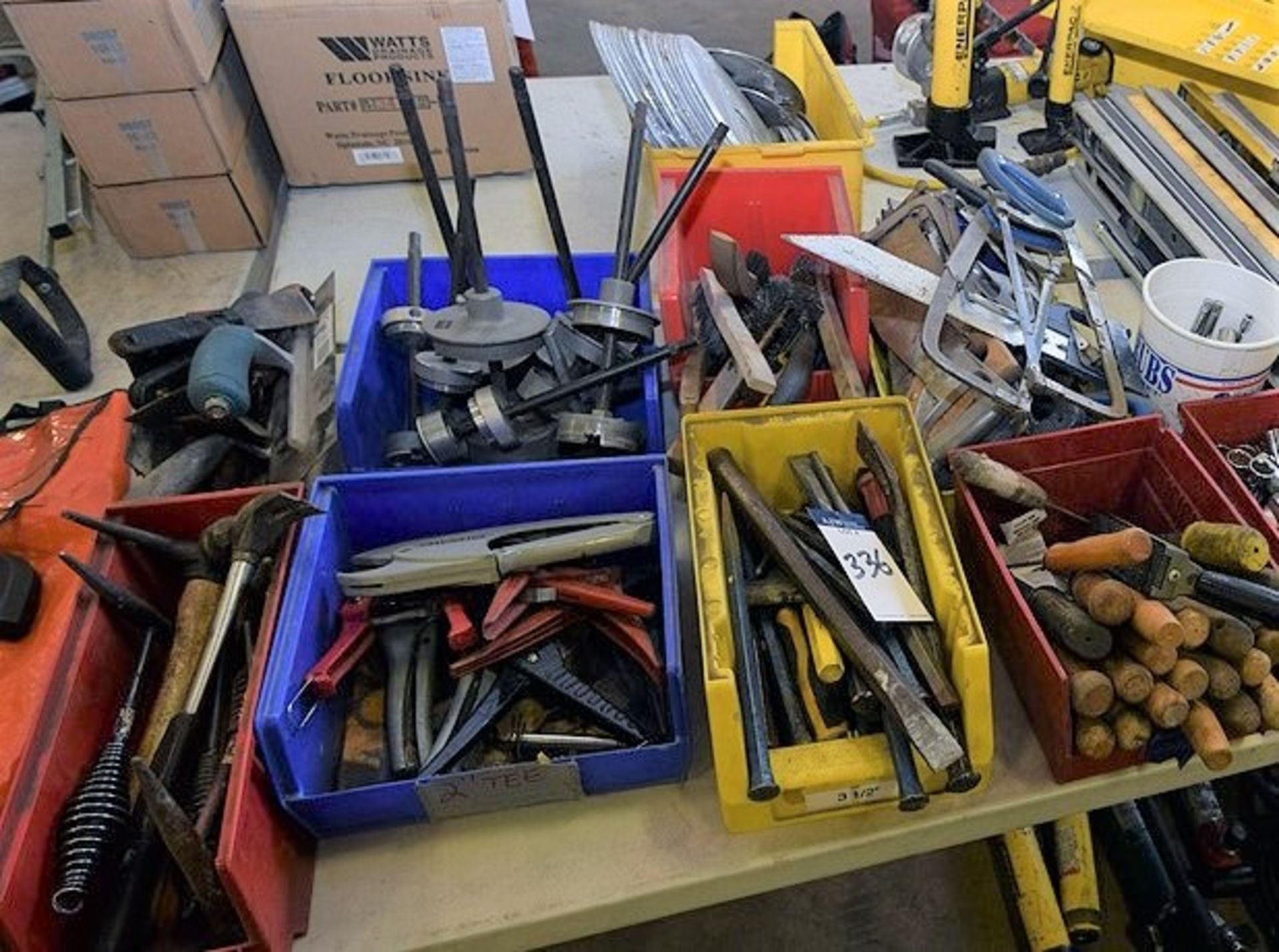 A Large Group of Ass't Hand Tools Including Saws, Chipping Hammers, Chisels, Pipe Cutters, and Wire