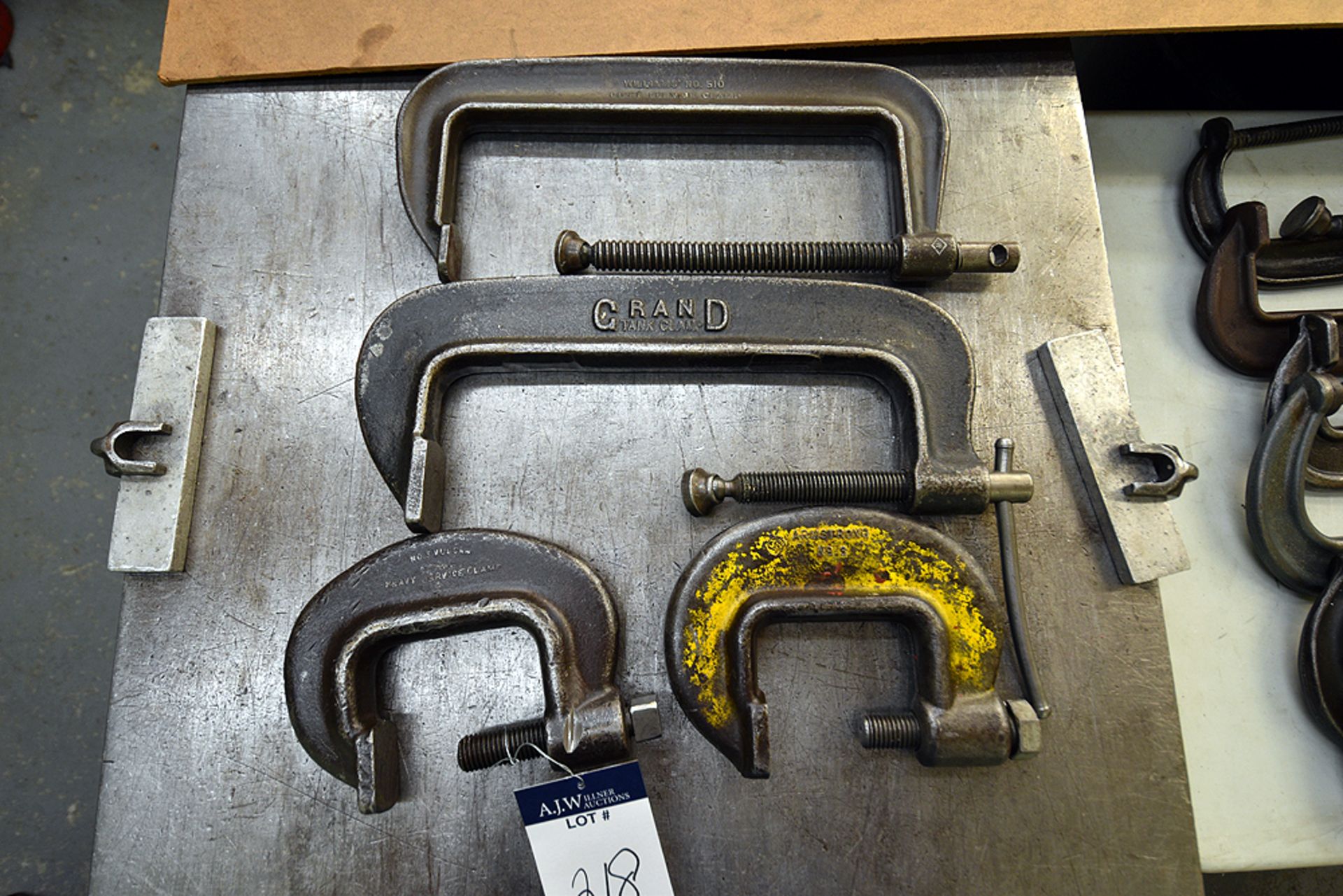 {each} Ass't "C" Clamps: (1) Williams 10", (1) Grand 10", (1) Armstrong 3", and (1) Vulcan 3"