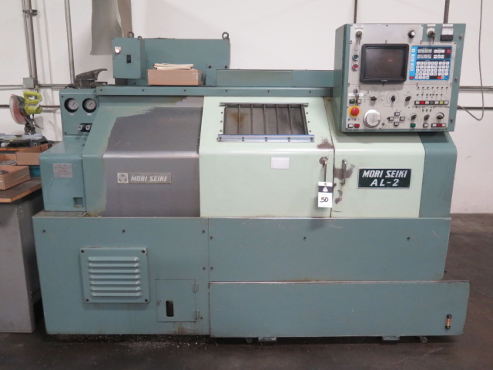 Mori Seiki AL-2ATM CNC Lathe s/n 58 w/ Yasnac Controls, Tool Presetter, 8-Station Turret, SOLD AS IS