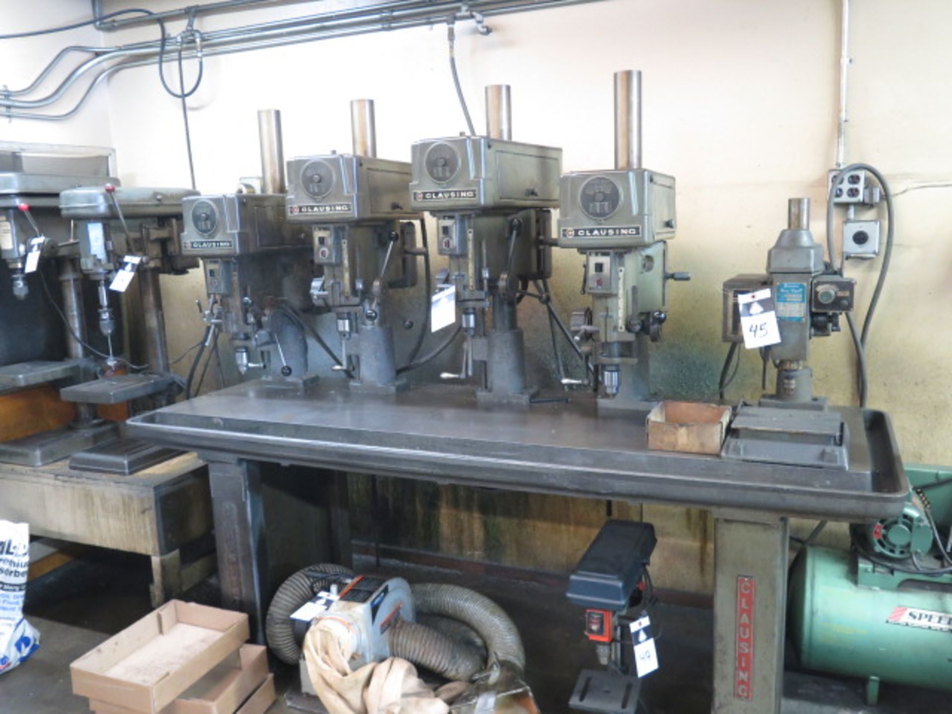Clausing 4-Head Gang Drill Press w/ 5-Speed Heads, 24” x 80” Table (SOLD AS-IS - NO WARRANTY)