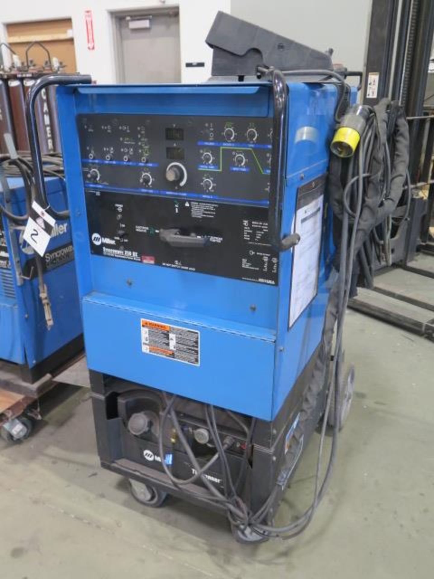 Miller Syncrowave 250DX CC-AC/DC Squarewave Weld Source s/n LC221423 w/ Miller TIGRunner, SOLD AS IS