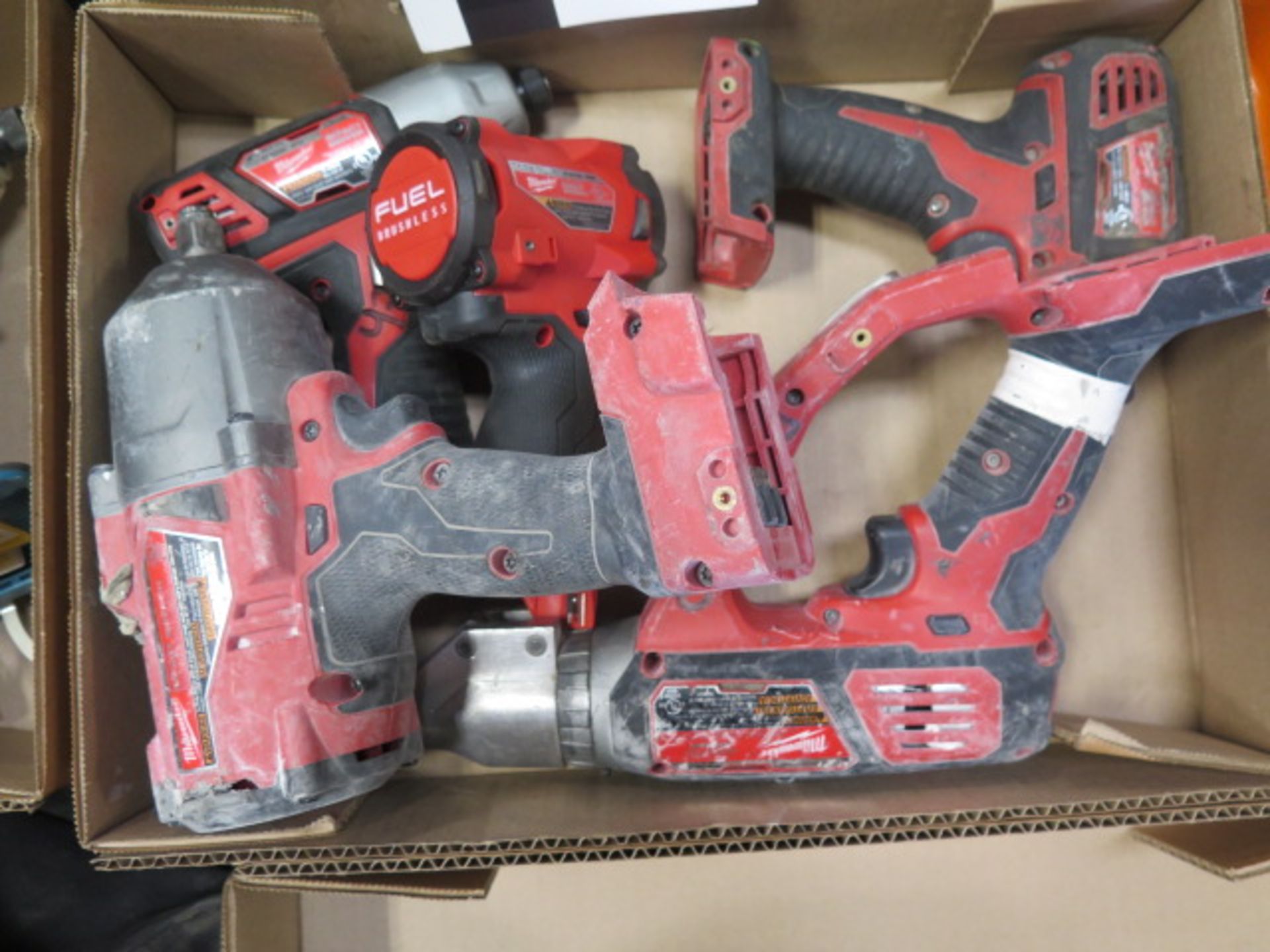 Milwaukee 18 Volt 1/2" and 3/8" Impacts, Scissor Shear and Nut Drivers (5) (SOLD AS-IS - NO - Image 2 of 5