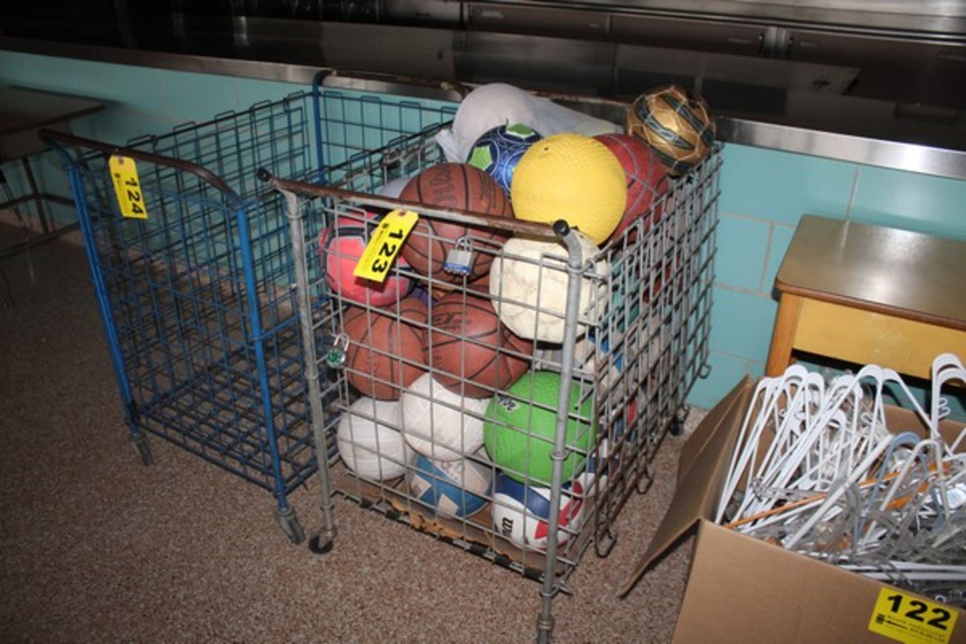 PORTABLE WIRE BASKET WITH LARGE QUANTITY OF BASKET, VOLLEY AND SOCCER BALLS, 24" X 36" X 33"