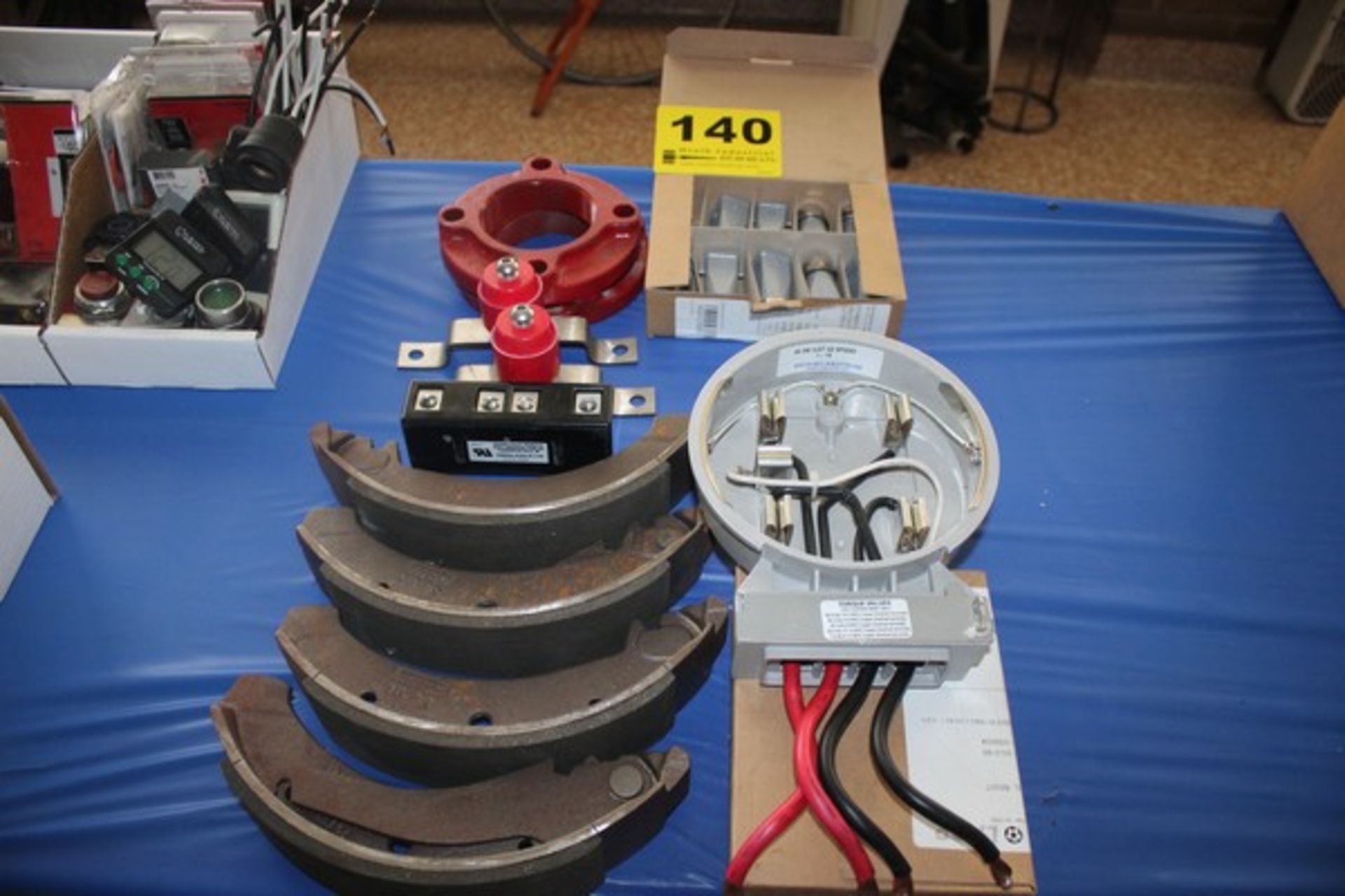 ASSORTED ELECTRICAL COMPONENTS AND BRAKE SHOES