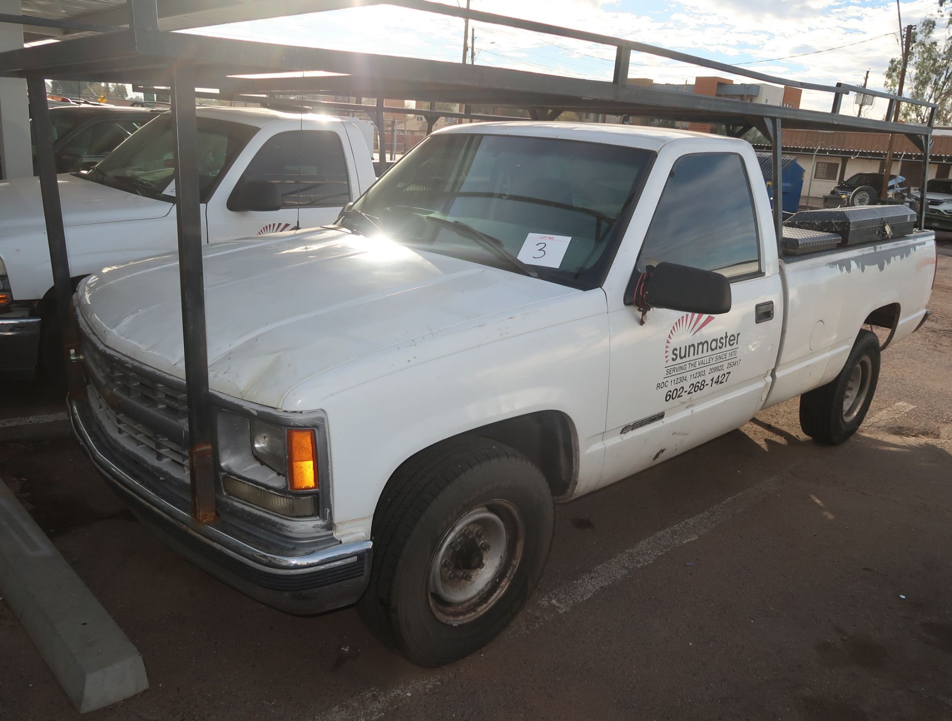 2000 CHEVY UTILITY TRUCK W/ STORAGE BOXES & RACK MI:149,983 WIN: 1GCGC24R7YR155209