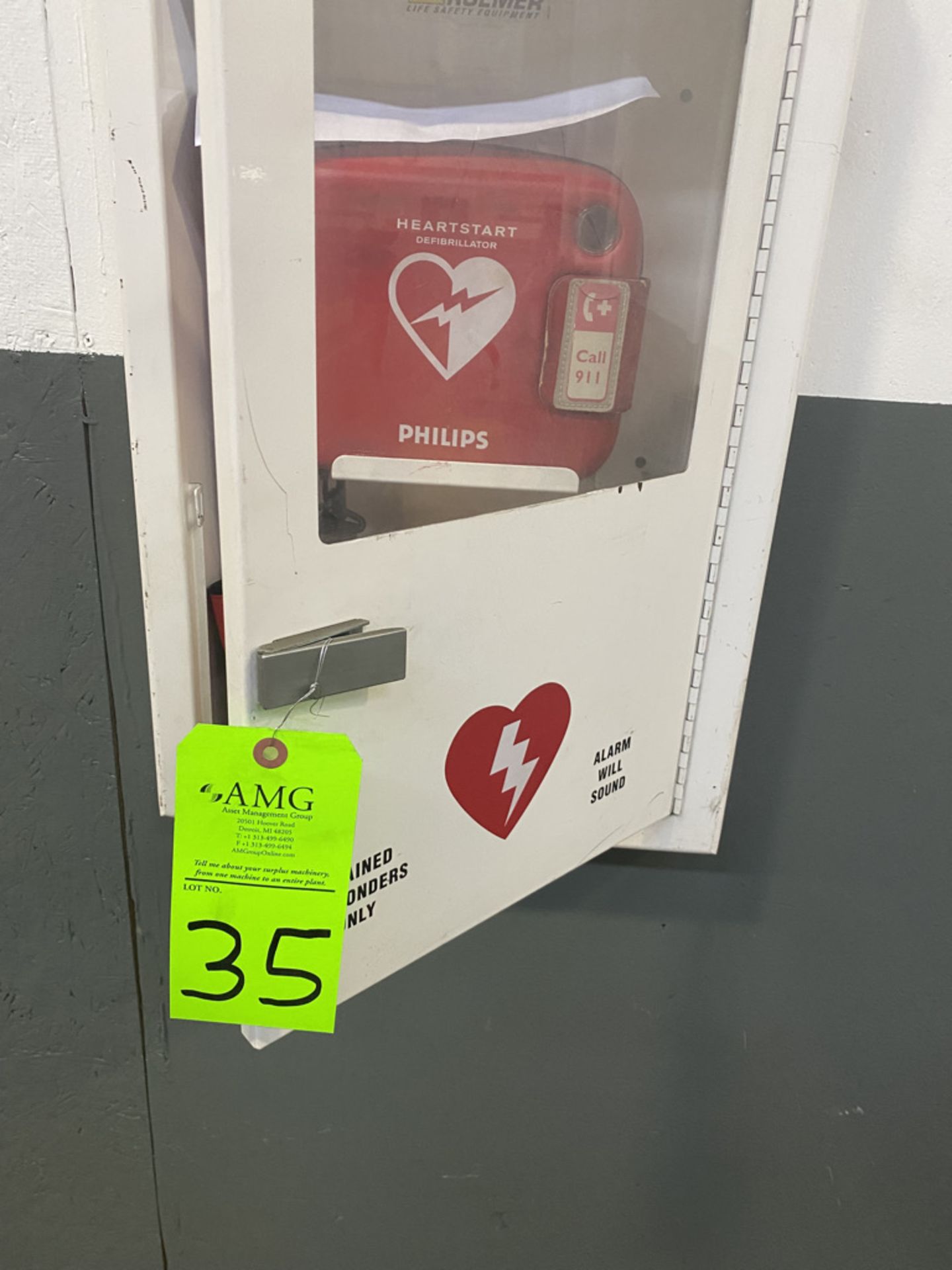 Phillips Heart start Defibrillator with box. ( no certification is given or implied)
