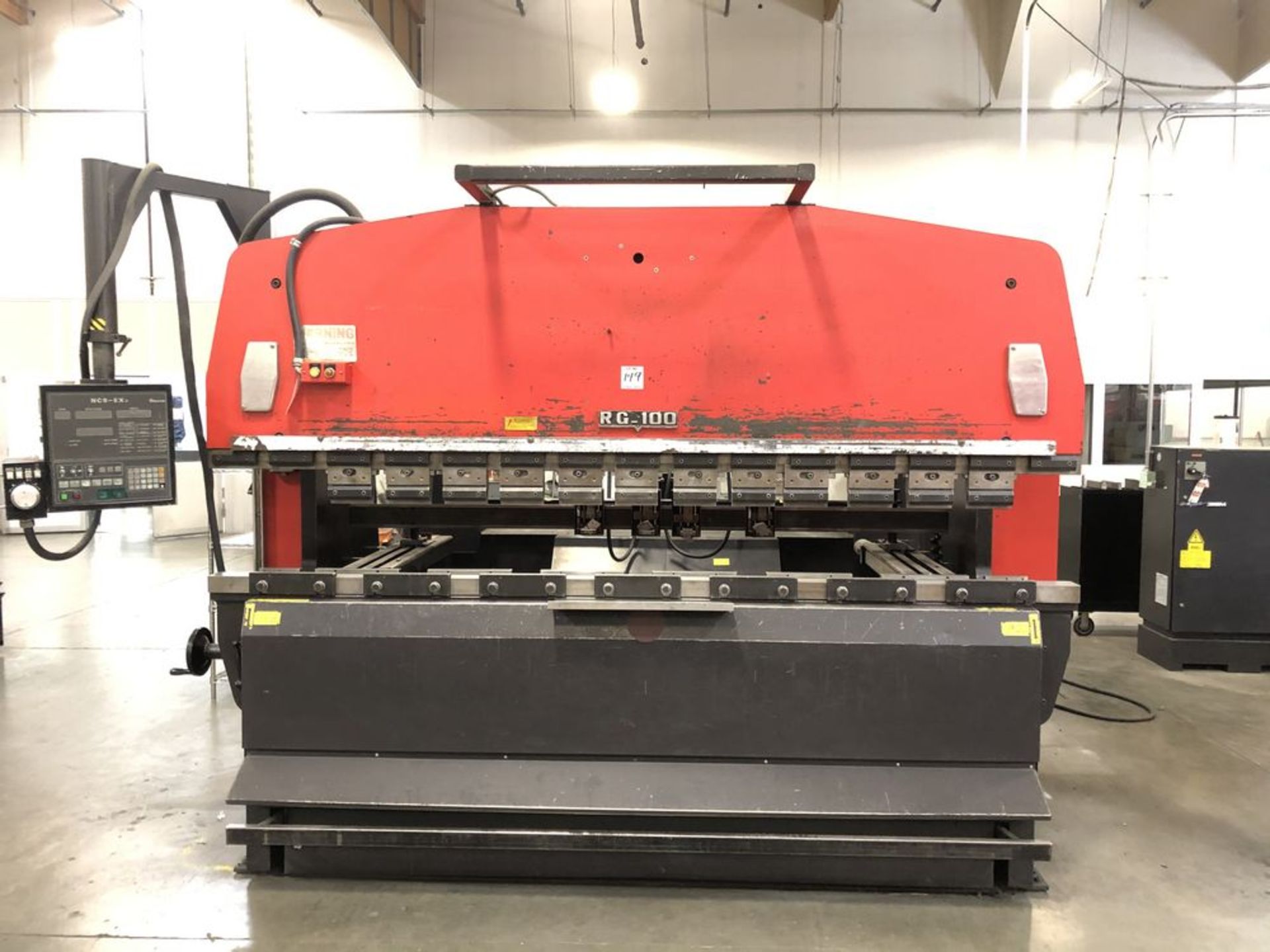 (1) 1994 Amada RG-100 CNC Press Brake- 110 ton cap, 118.2” bed length, 122.1” max bending length,