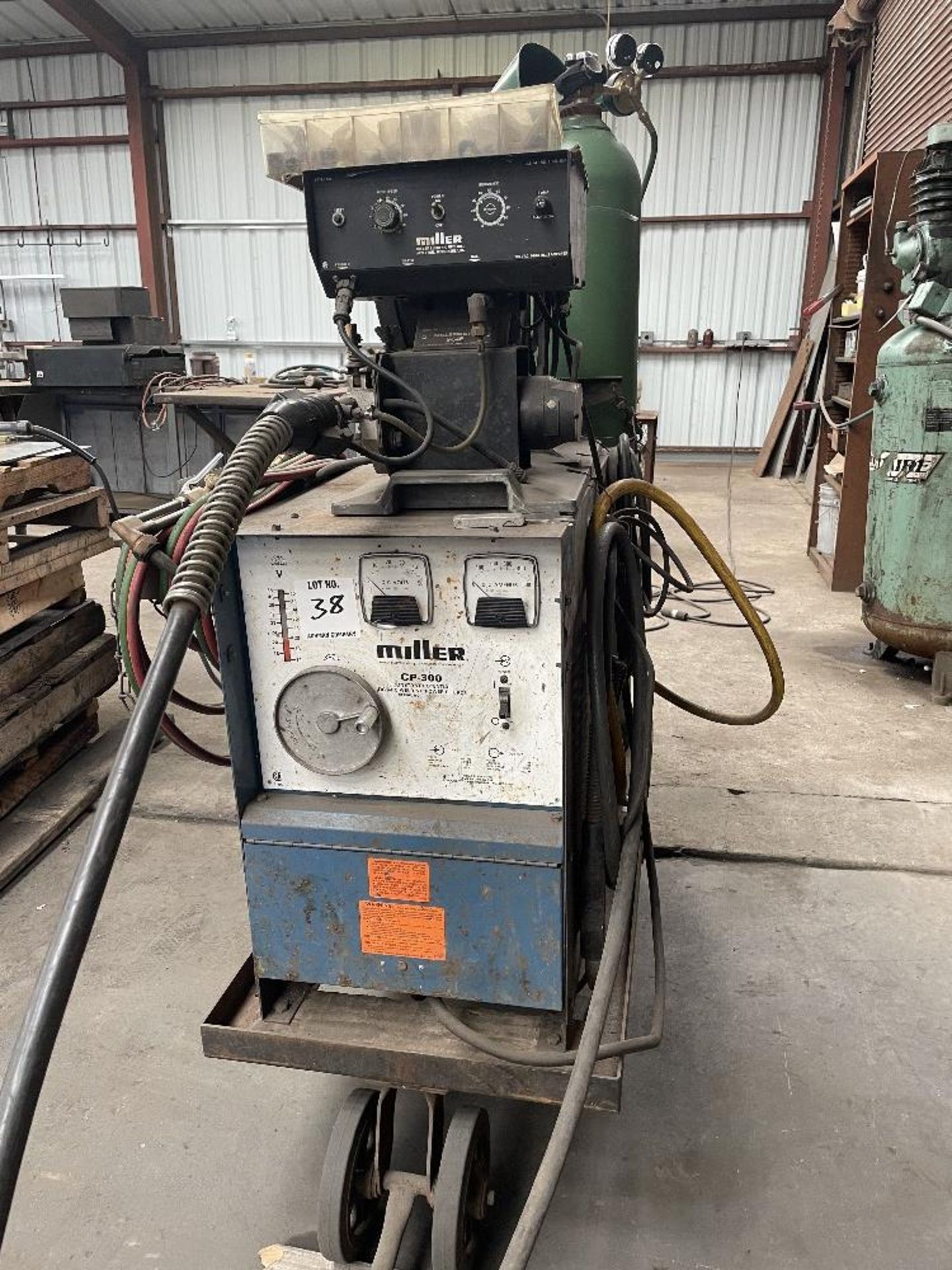 (1) MILLER CP-300 WIRE FEED WELDER WITH MILLERMATIC-S-54E WIRE FEEDER, S/N- JC626057