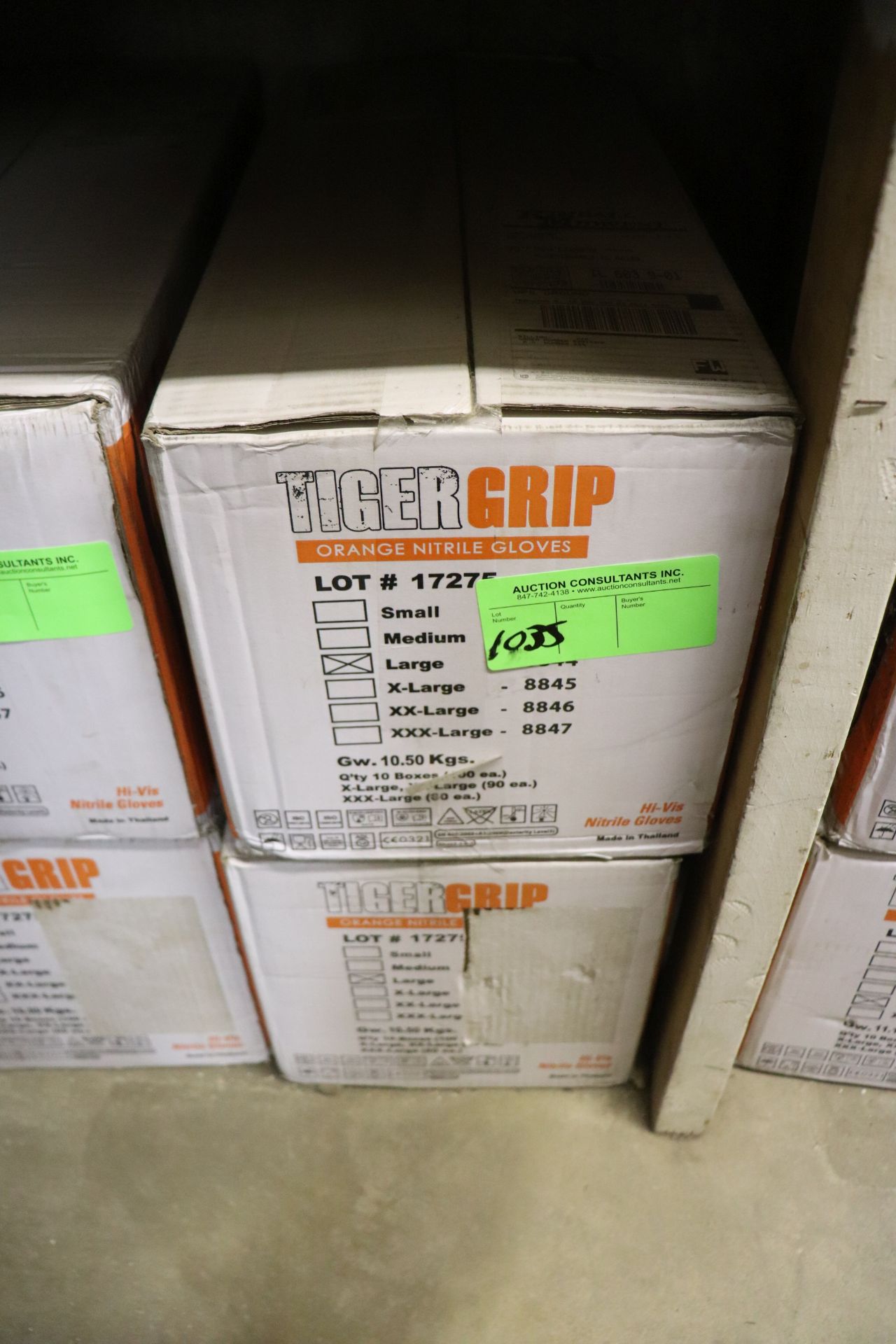 Two boxes of Tiger Grip Orange Nitrile gloves