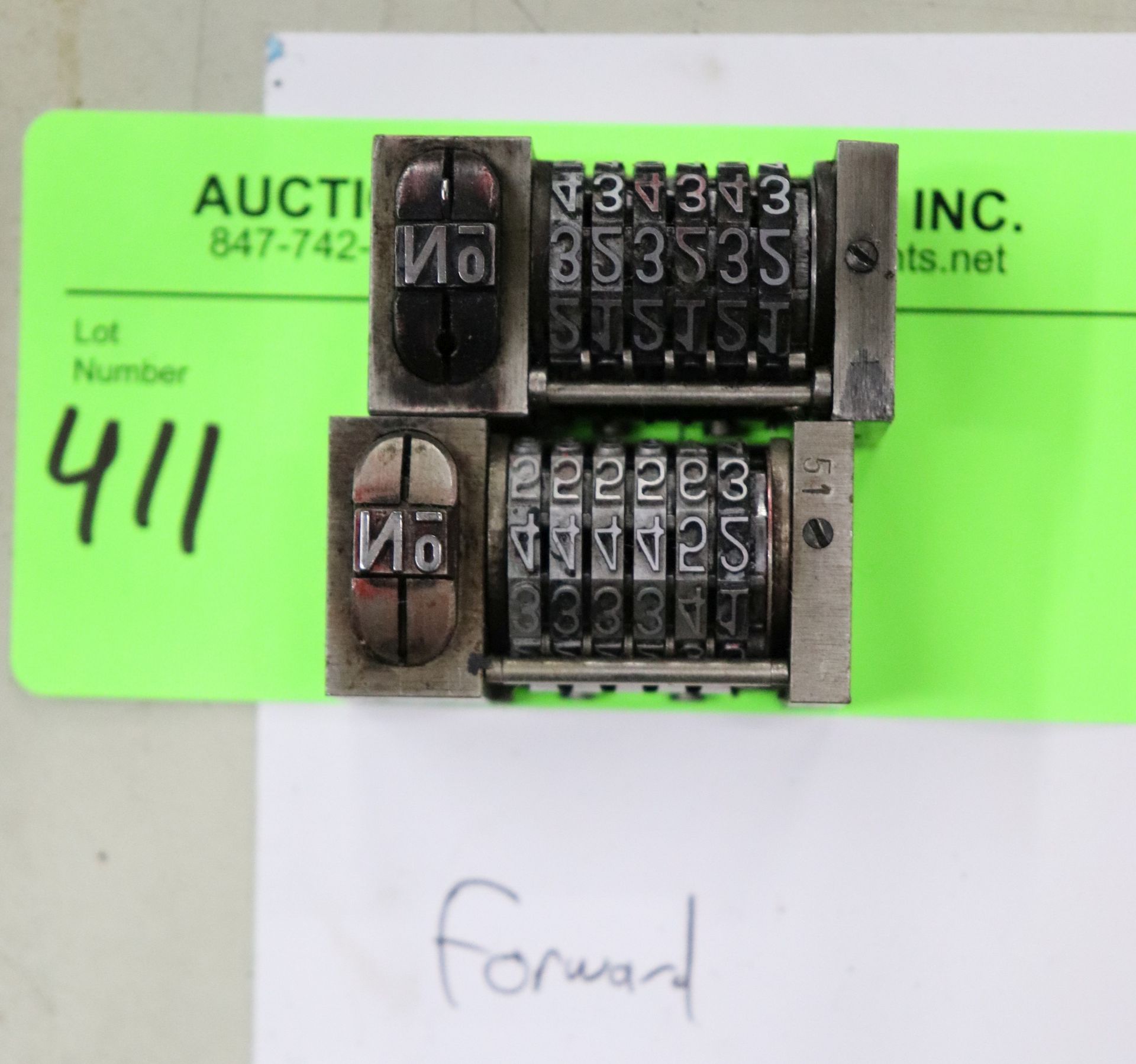 Set of two forward numbering machines