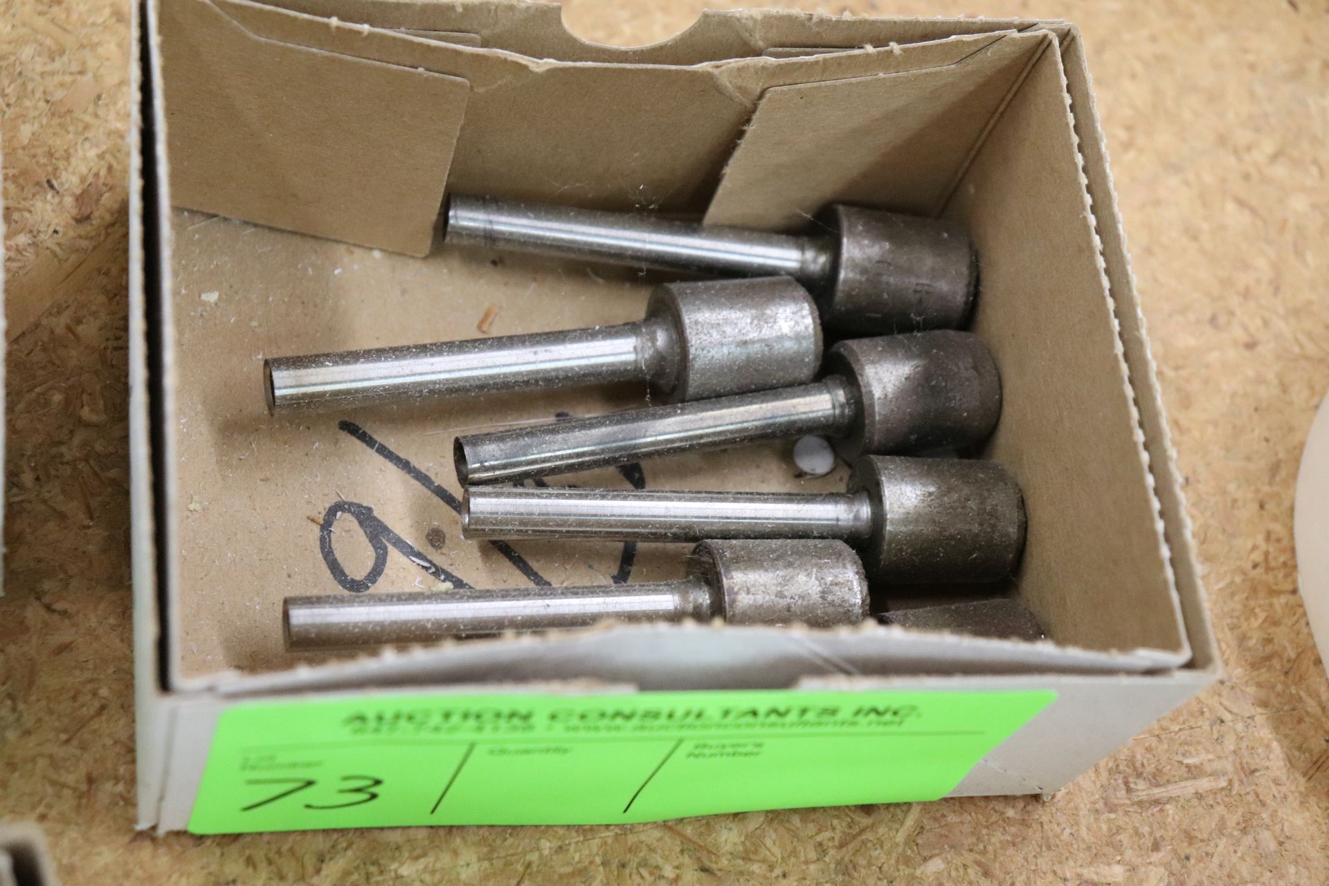 Group of hollow drill bits, various sizes