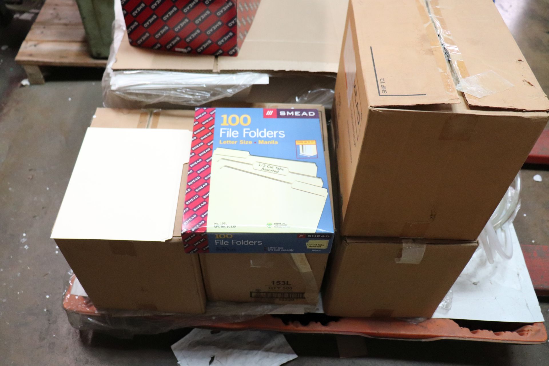 Pallet of paper products, blank cutters and folders