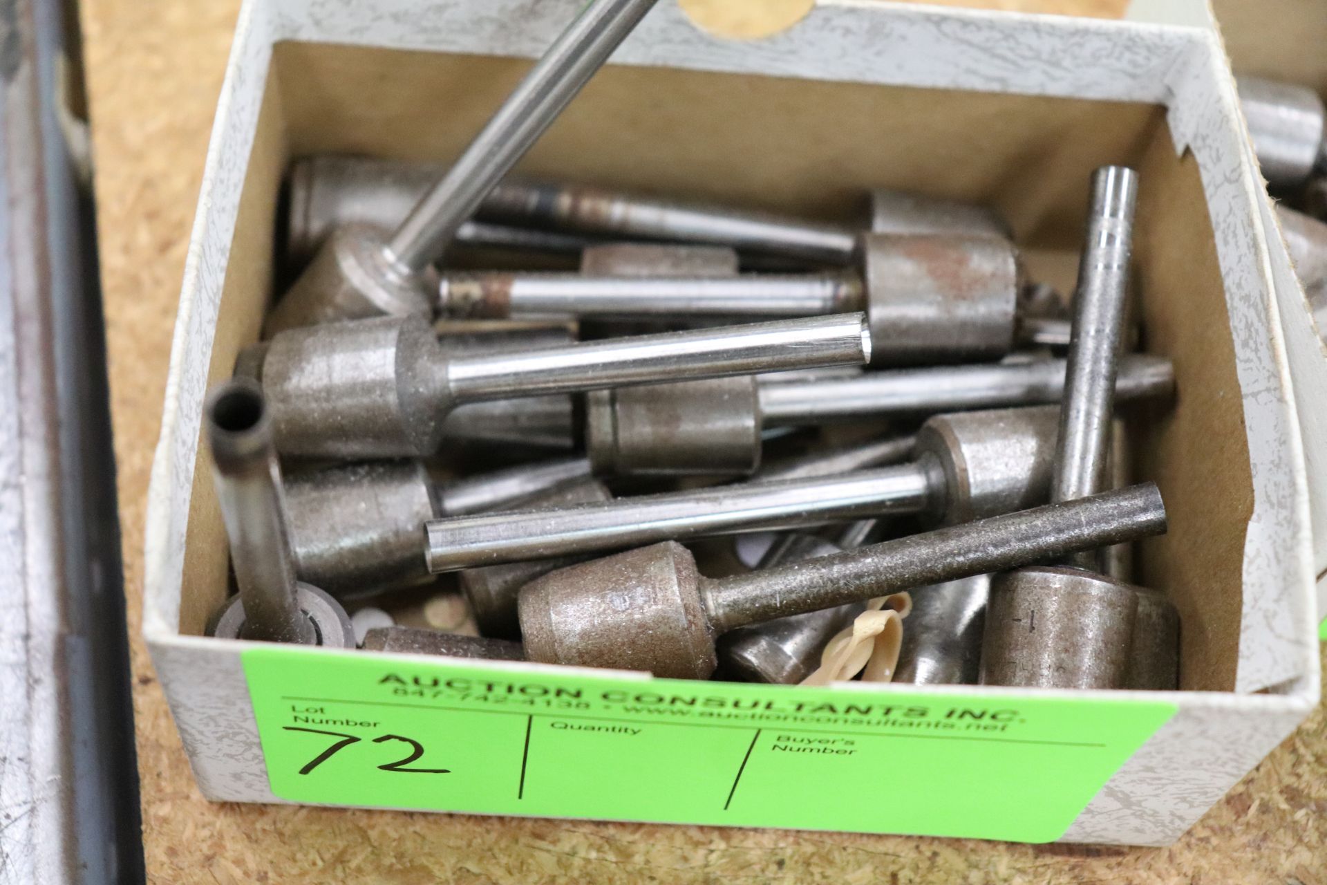 Group of hollow drill bits, various sizes
