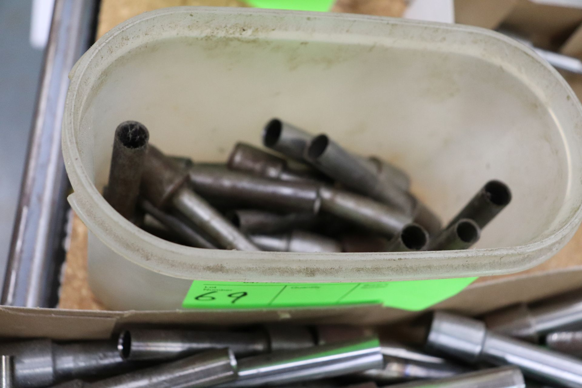 Group of hollow drill bits, various sizes