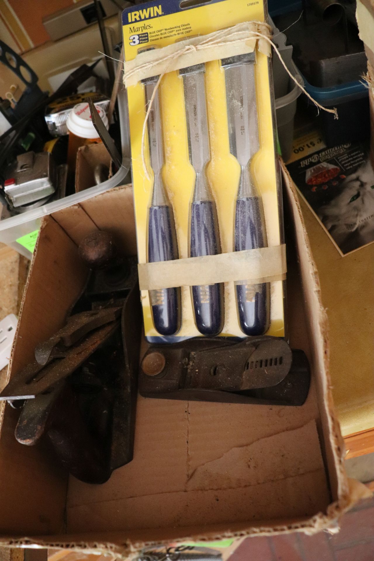 Group of wood planers and woodworking chisels