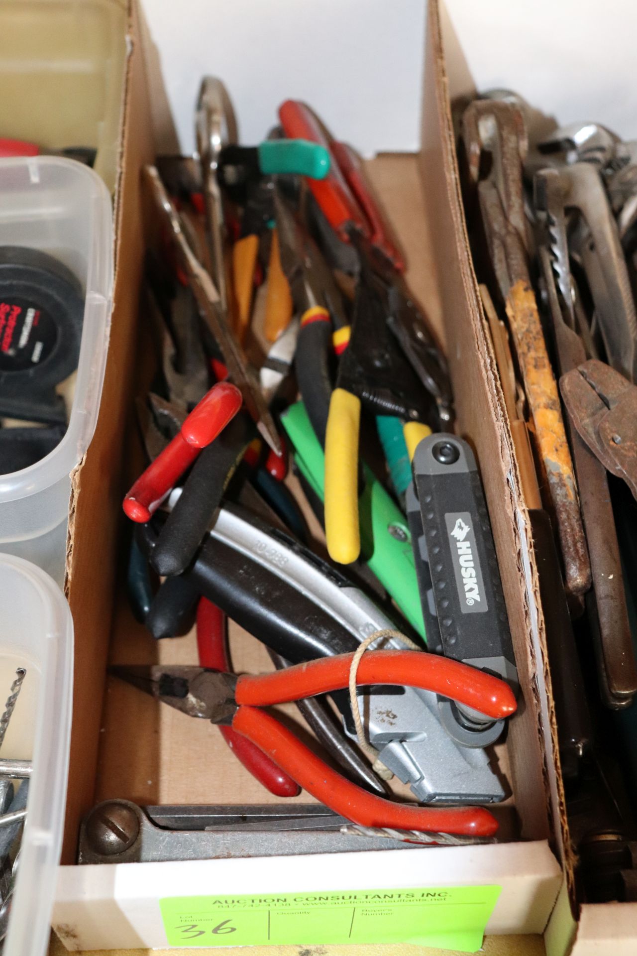 Group of needlenose pliers, Allen key set, and wire cutters