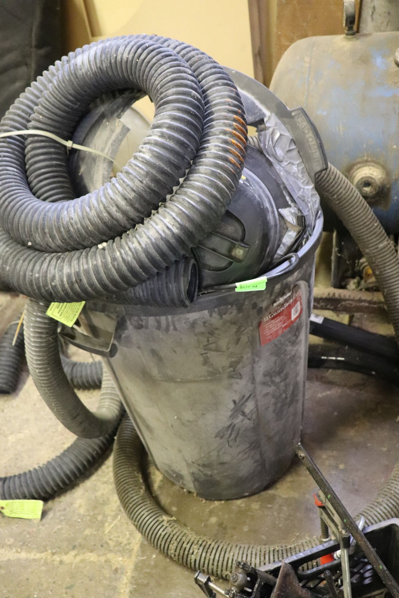 Shop vac and garbage can