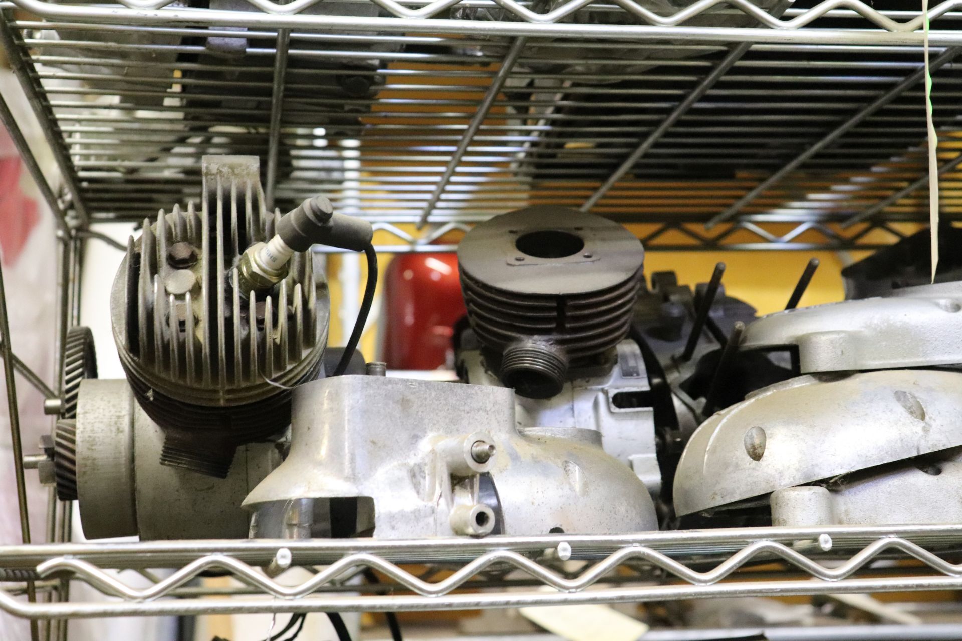 Entire shelf including mini bike motor parts, engine cases, crank assemblies, cylinders and cylinder - Image 2 of 7