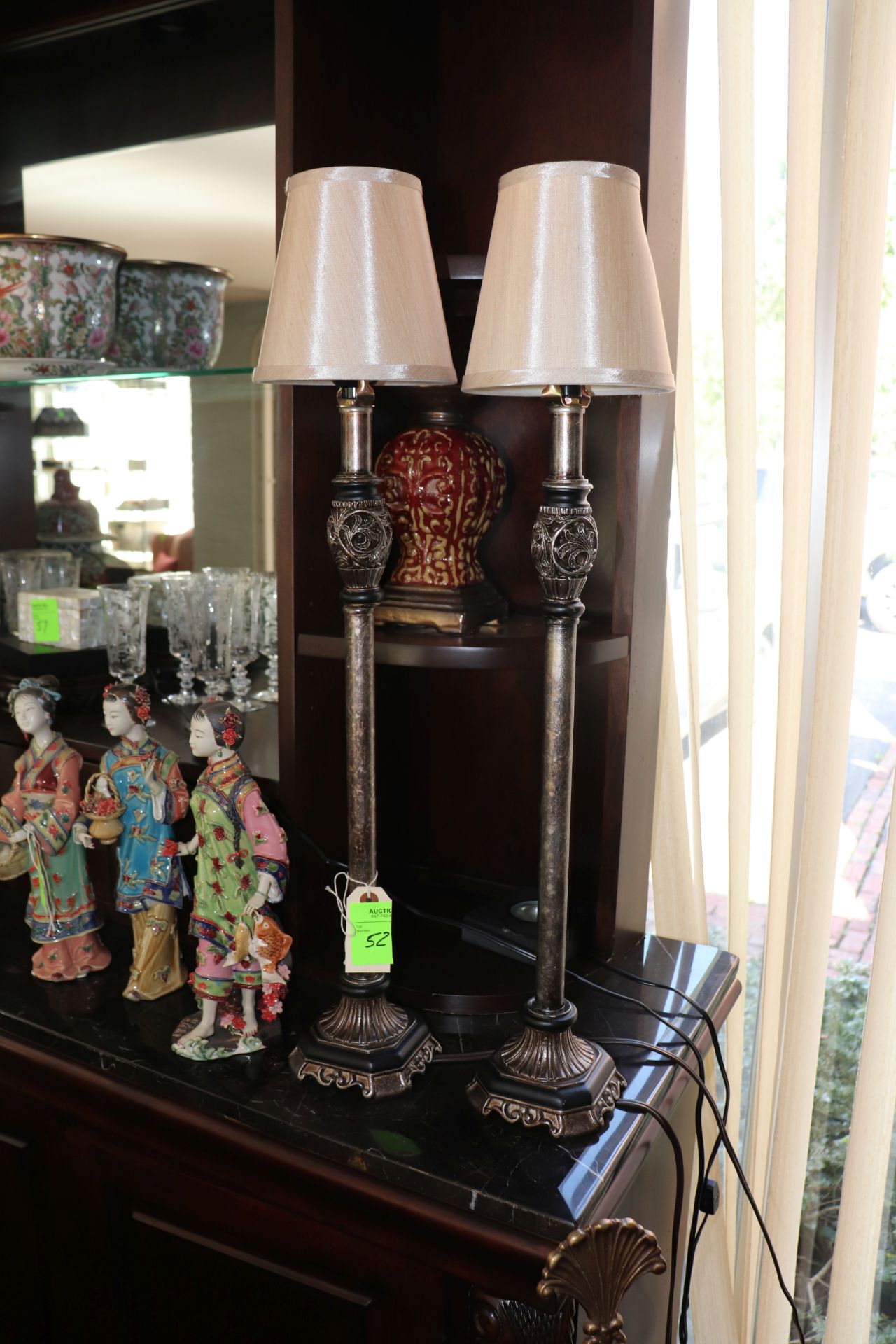 Pair of Italian style patinated metal table lamps, candle design, each fitted with beige shade, appr
