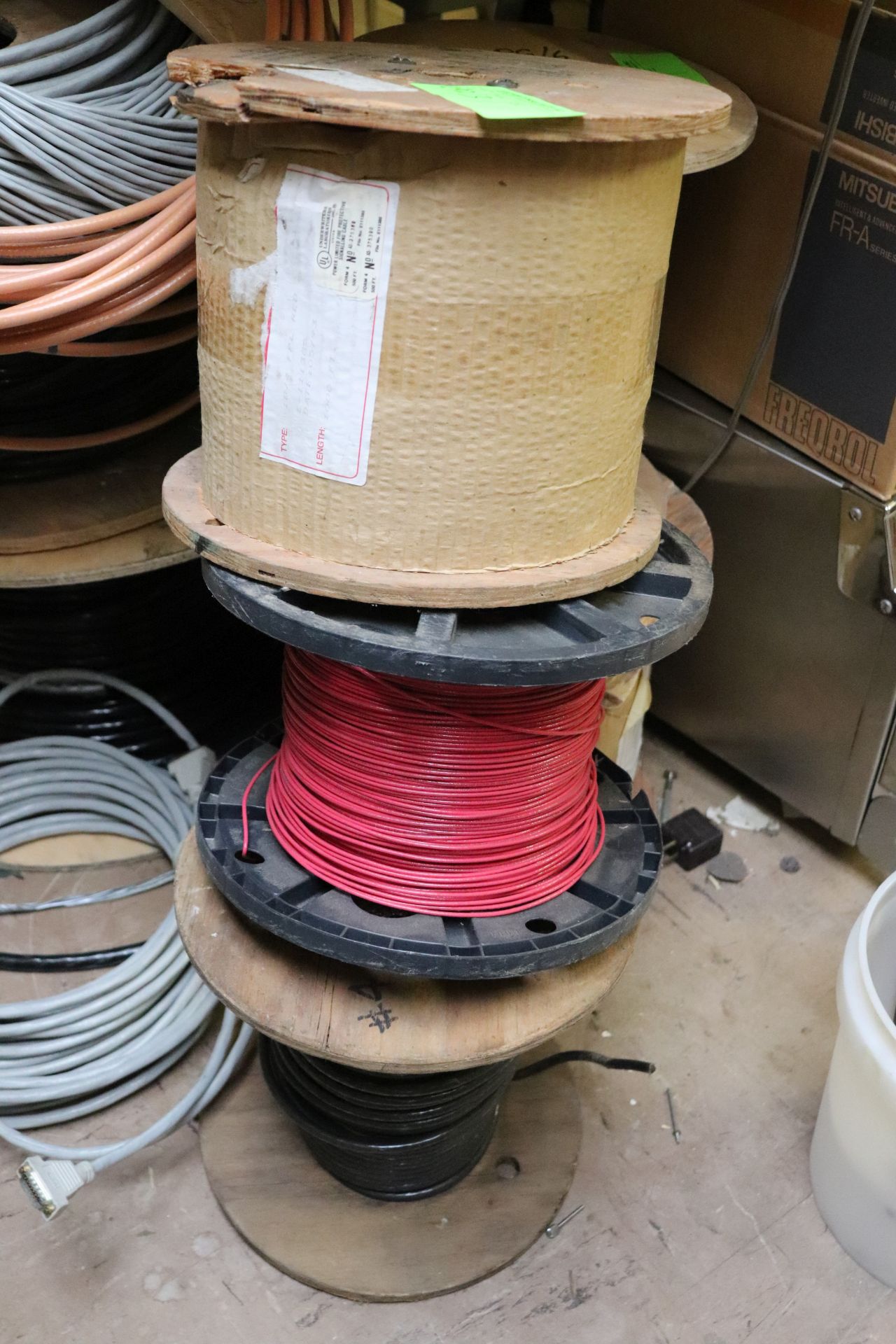 Two spools of communication wire