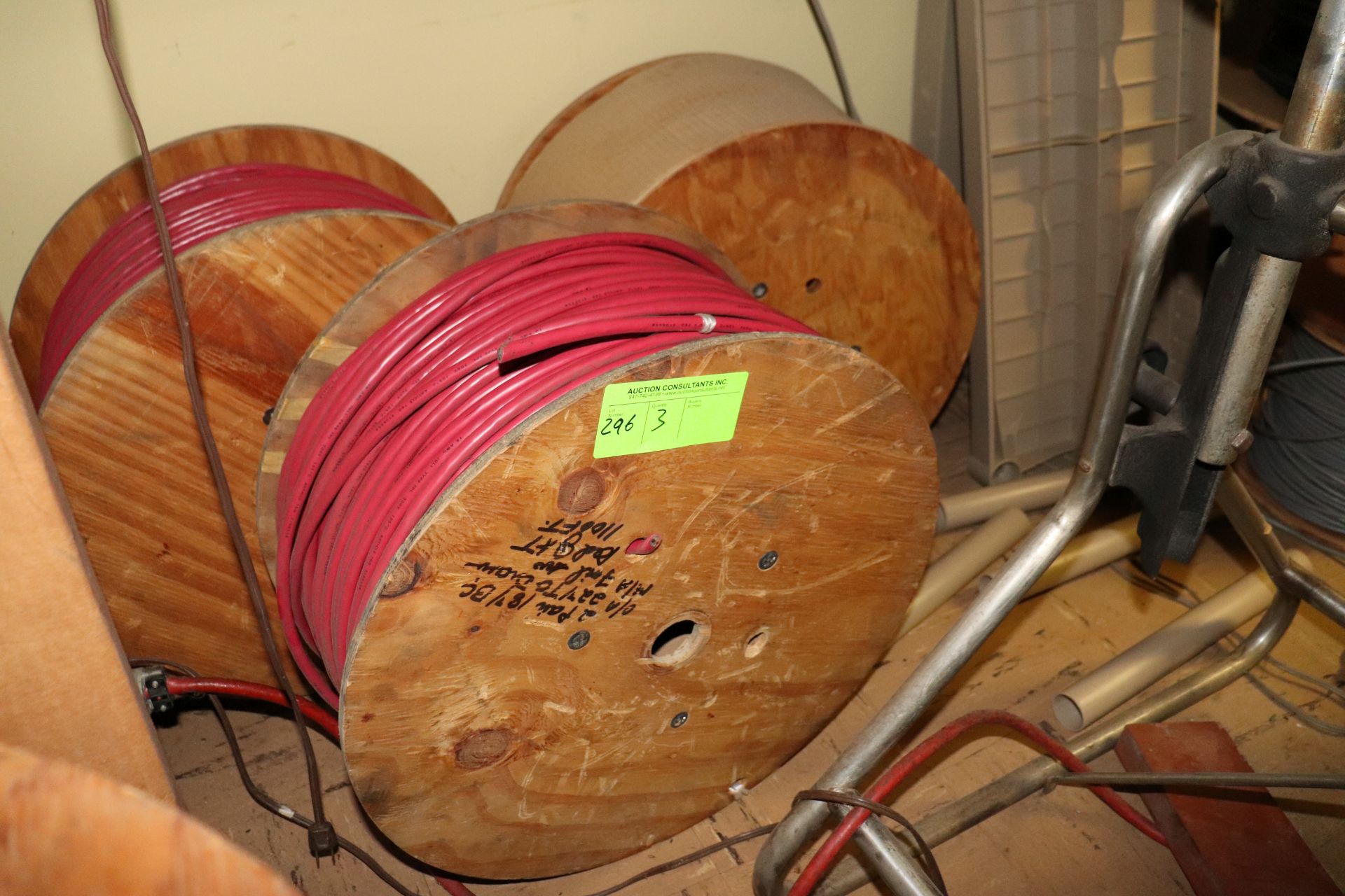 Three spools of communication wire