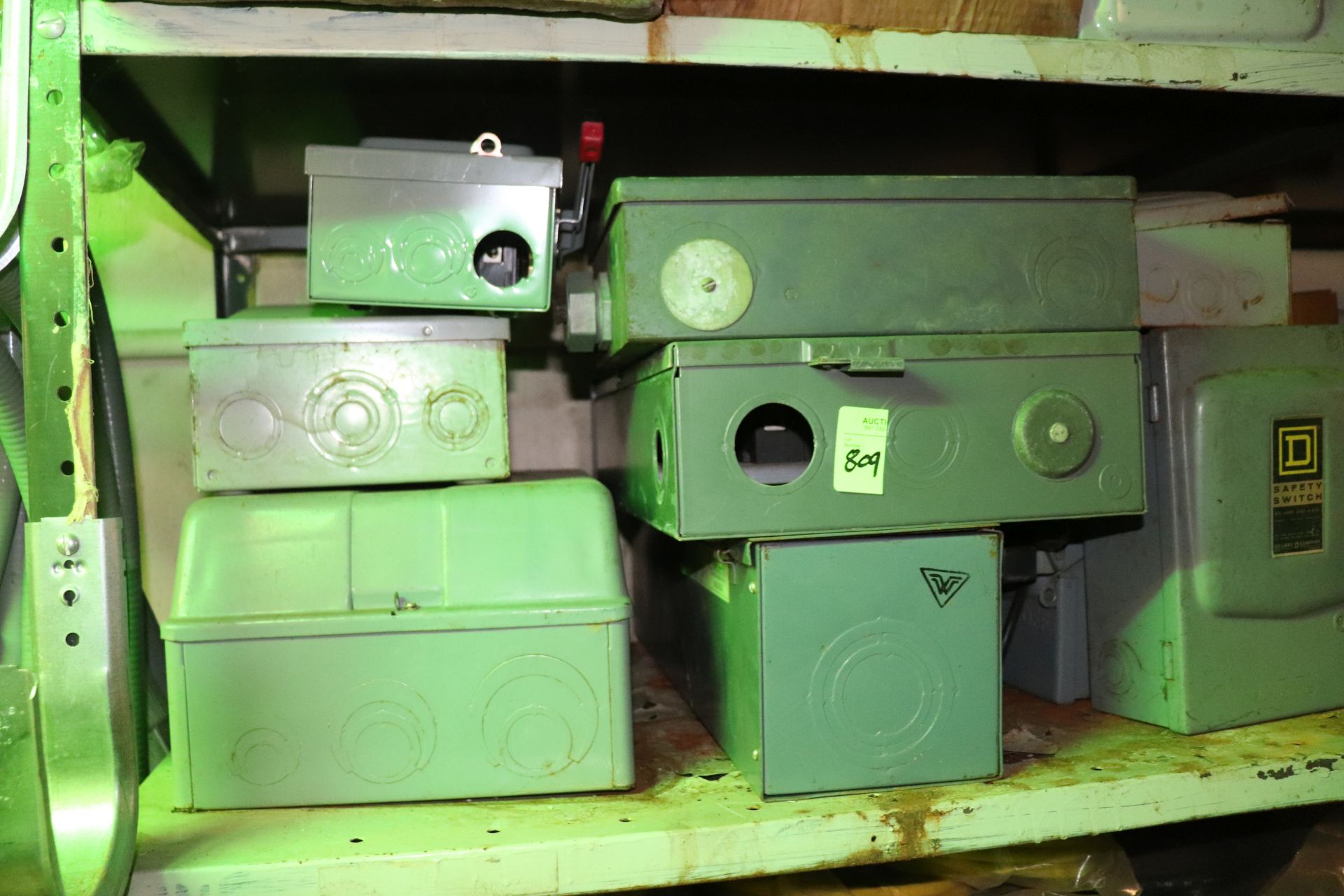 Two shelves of enclosures and heavy duty safety switches - Image 4 of 5