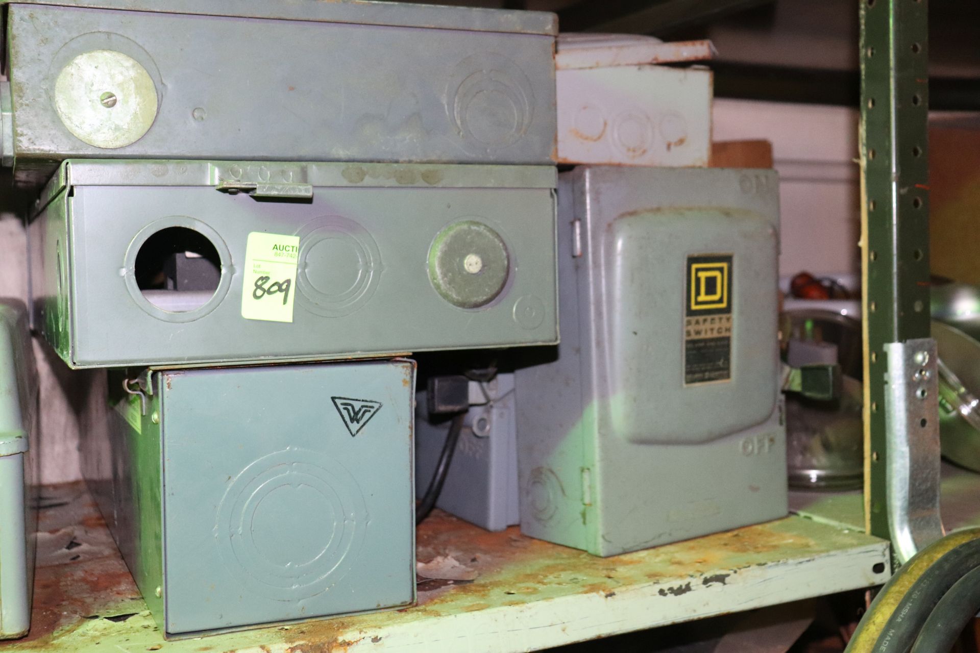 Two shelves of enclosures and heavy duty safety switches - Image 5 of 5