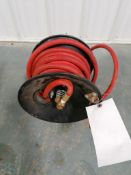 (1) Air Hose with Reel. Located in Mt. Pleasant, IA.