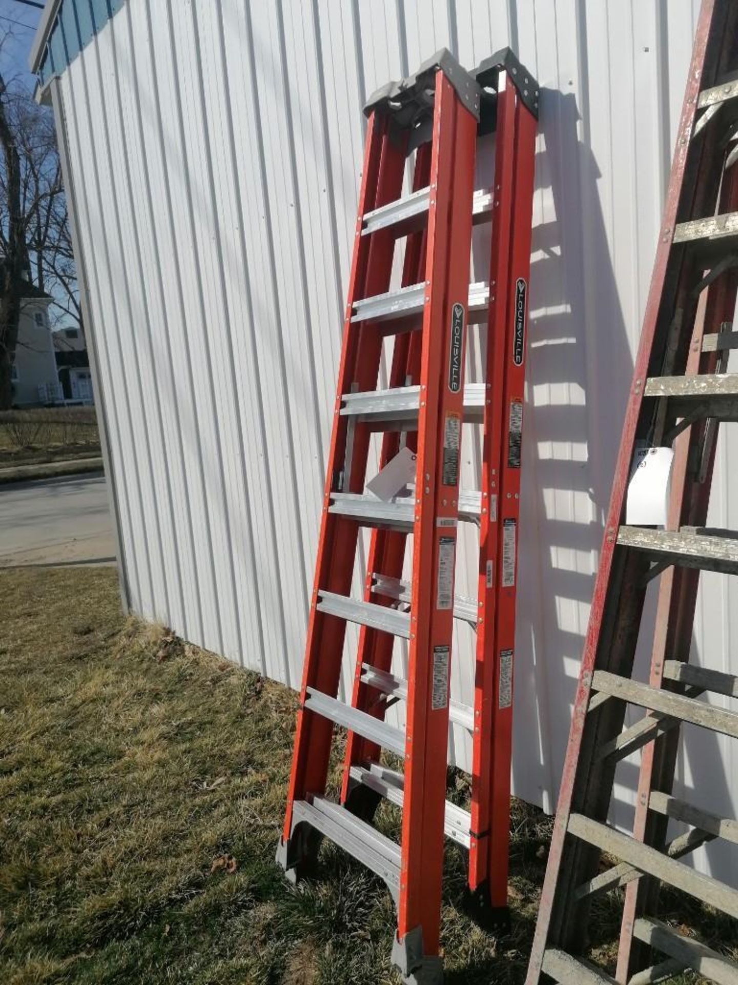 (2) NEW Louisville 8' Step Ladders. Located in Mt. Pleasant, IA.