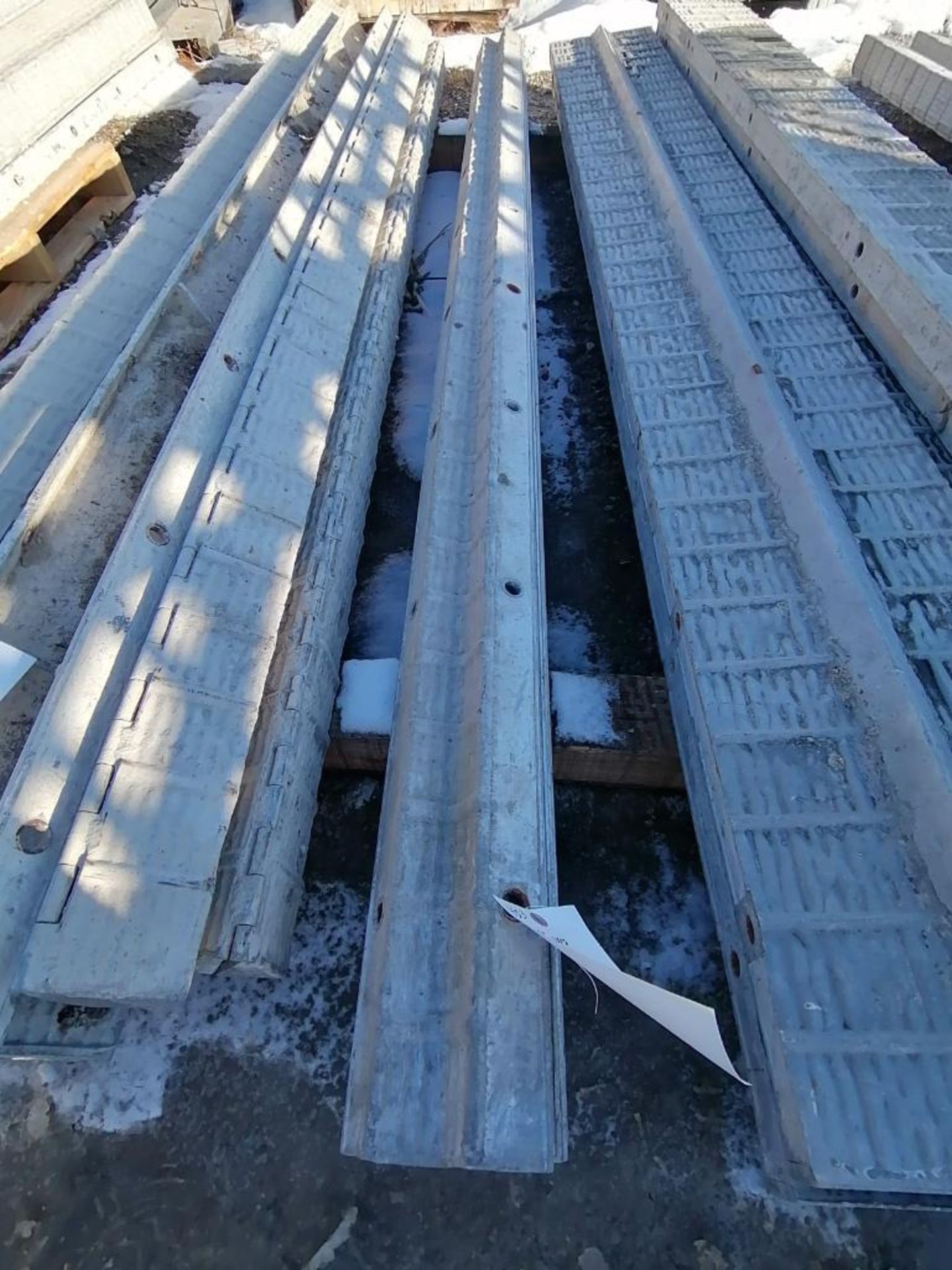 (6) 9' Ws VertiBrick Aluminum Concrete Forms 6-12 Hole Pattern. Located in Lincoln, NE.