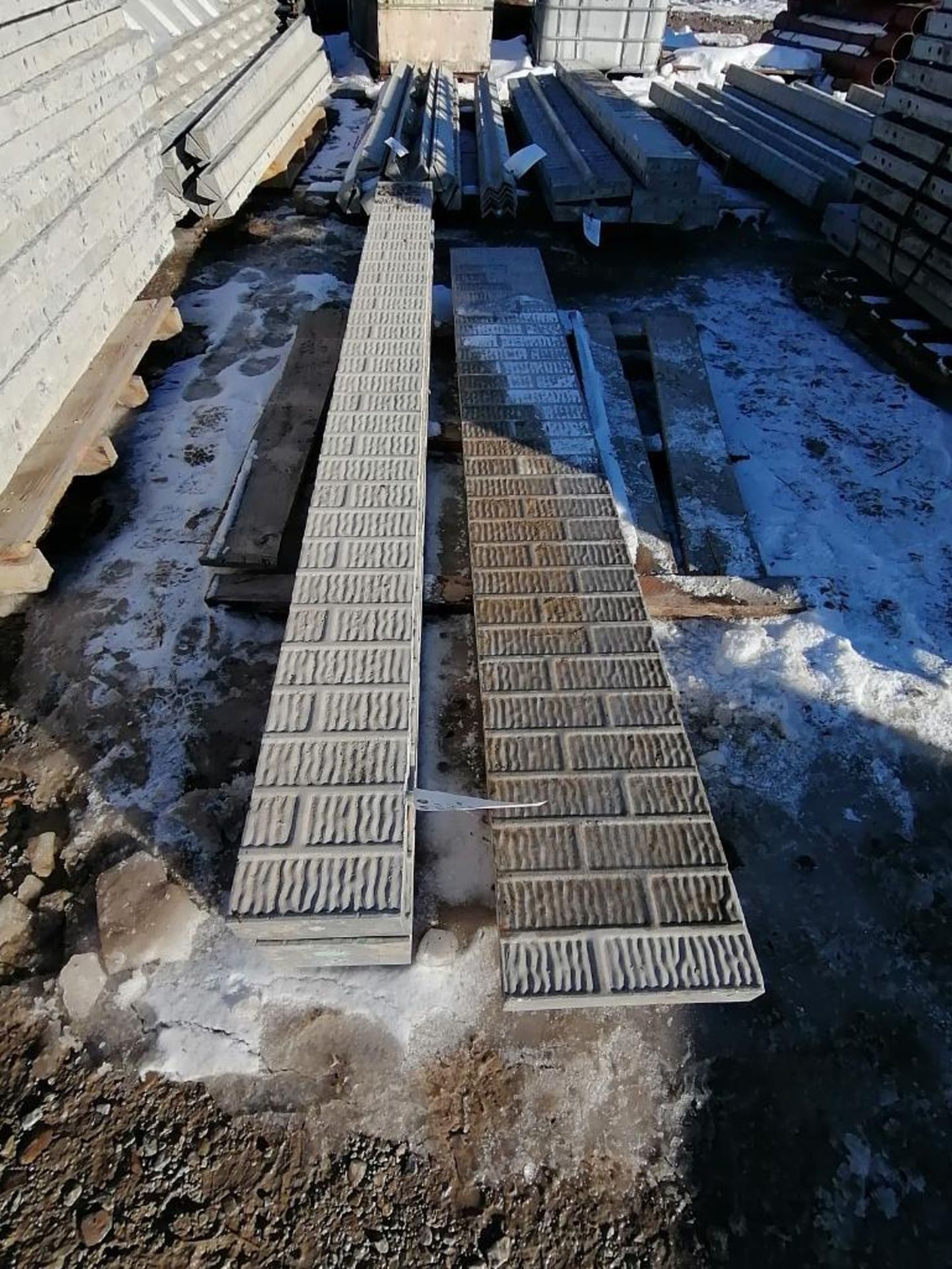 (1) 12" x 8' & (4) 7" x 8' VertiBrick Aluminum Concrete Forms 6-12 Hole Pattern. Located in Lincoln,
