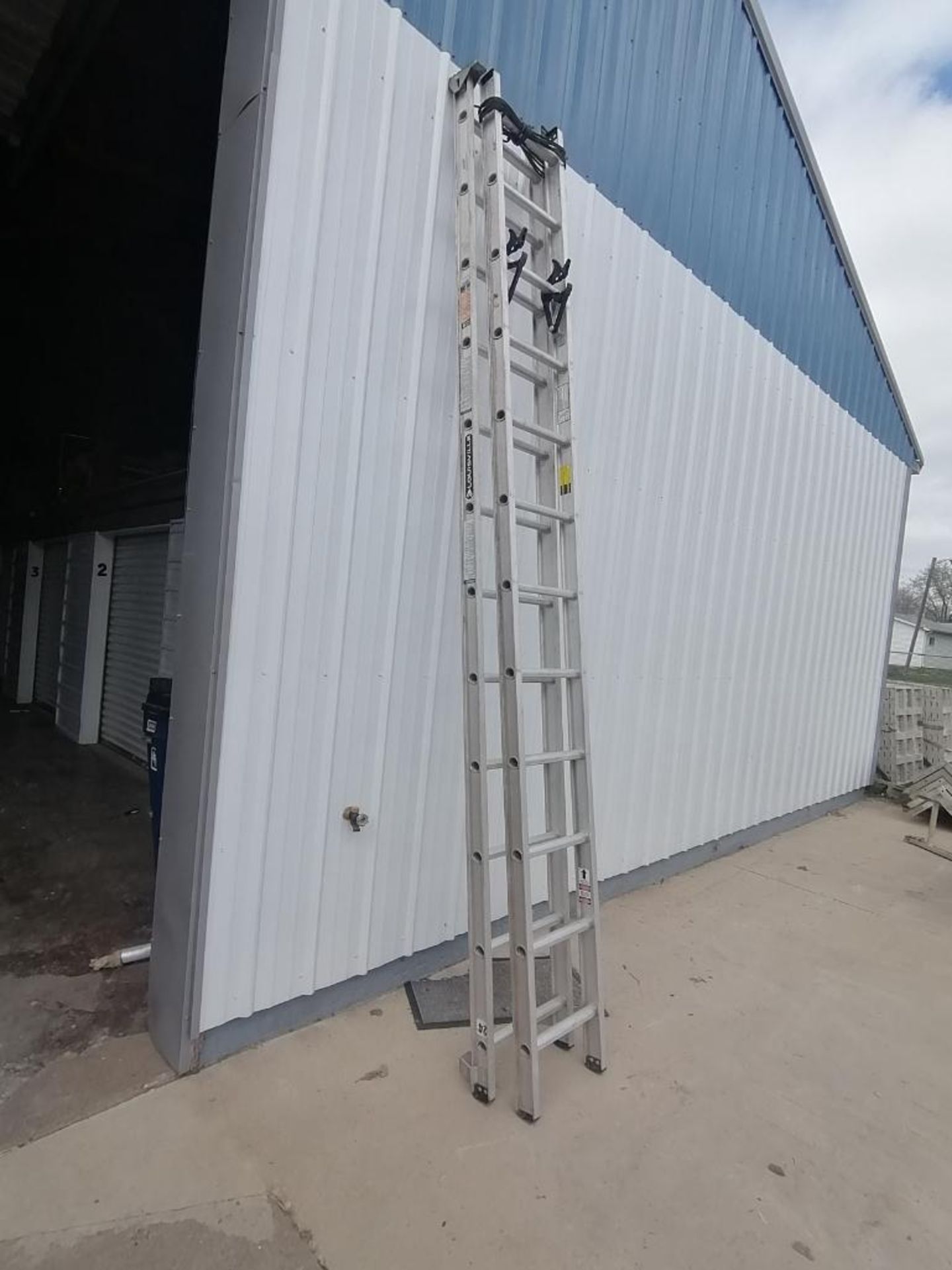 (1) 24' Louisville Aluminum Ladder. Located in Mt. Pleasant, IA.